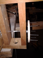 The crown wheel mounted in the frame